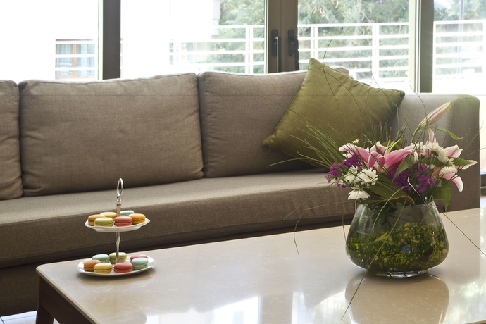 Imagen de la habitación del Tzl Suites. Foto 15