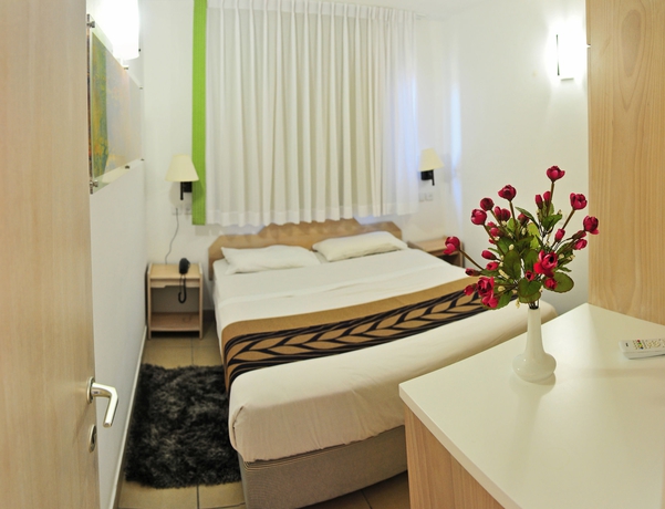 Imagen de la habitación del Tzuba Hotel. Foto 7