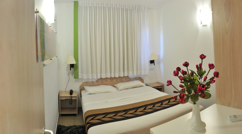 Imagen de la habitación del Tzuba Hotel. Foto 9
