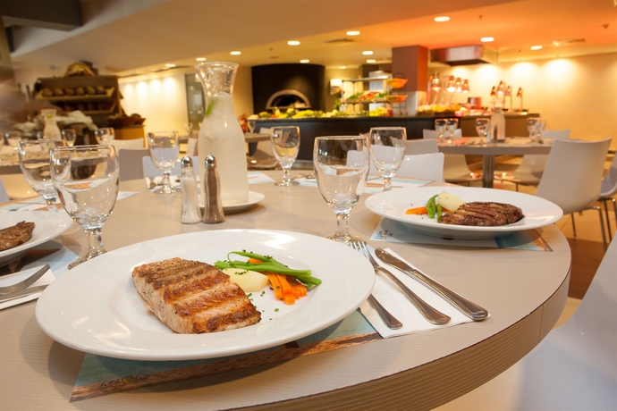 Imagen del bar/restaurante del U Coral Beach Club Eilat Ultra All Inclusive. Foto 3