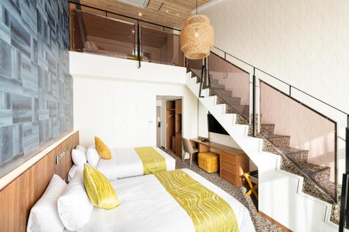 Imagen de la habitación del UE Garden Resort. Foto 19