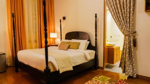 Imagen de la habitación del UNWND BOUTIQUE HOTEL CALATAGAN. Foto 15