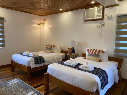 Imagen de la habitación del UNWND BOUTIQUE HOTEL CALATAGAN. Foto 19
