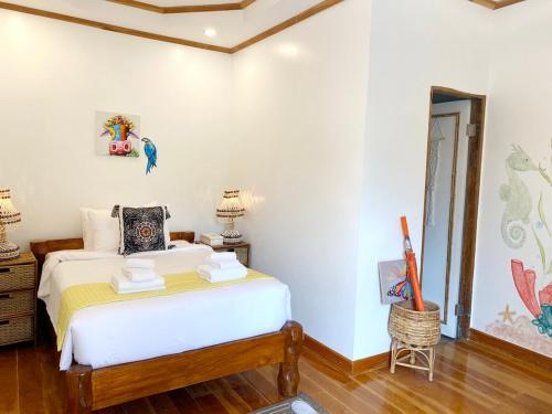 Imagen de la habitación del UNWND BOUTIQUE HOTEL CALATAGAN. Foto 20
