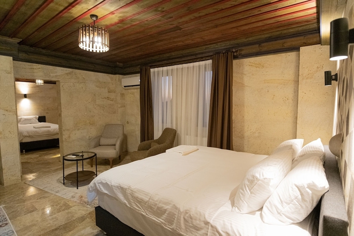Imagen de la habitación del U&ccedil;hisar Premium Hotel. Foto 2