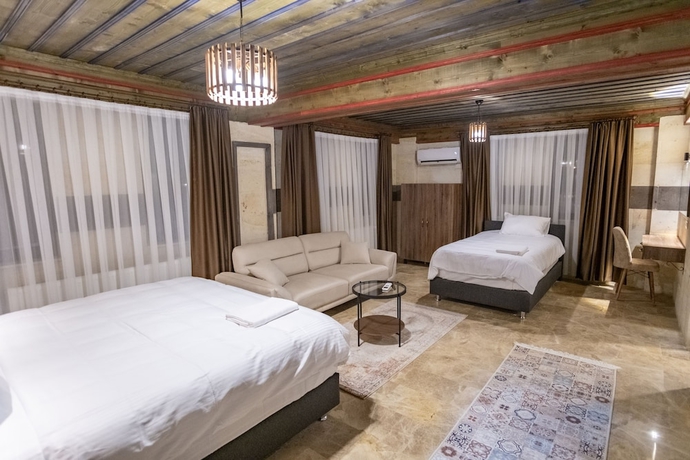 Imagen de la habitación del U&ccedil;hisar Premium Hotel. Foto 8