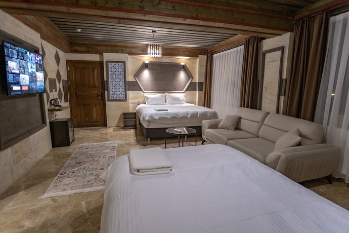Imagen de la habitación del U&ccedil;hisar Premium Hotel. Foto 9