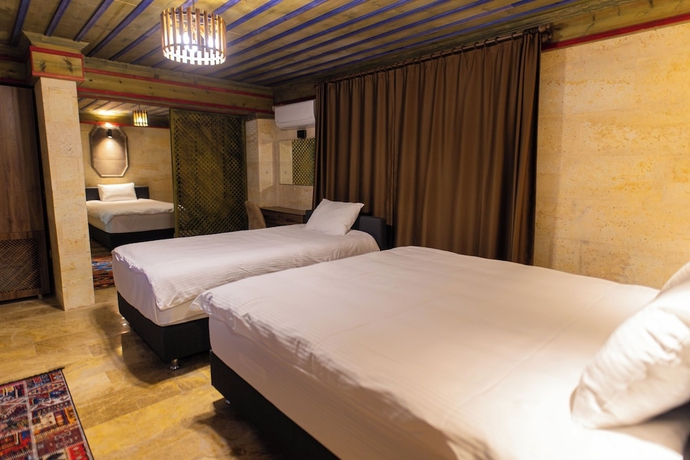 Imagen de la habitación del U&ccedil;hisar Premium Hotel. Foto 10