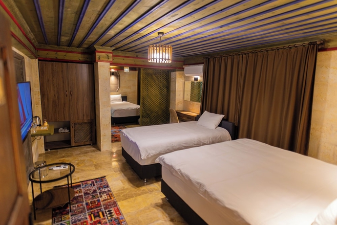 Imagen de la habitación del U&ccedil;hisar Premium Hotel. Foto 11