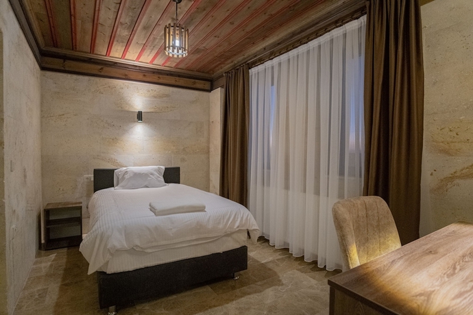 Imagen de la habitación del U&ccedil;hisar Premium Hotel. Foto 12