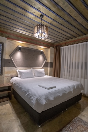 Imagen de la habitación del U&ccedil;hisar Premium Hotel. Foto 14