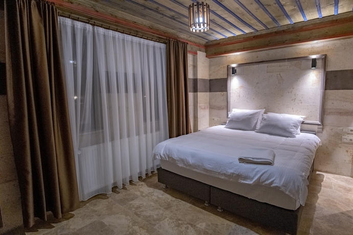 Imagen de la habitación del U&ccedil;hisar Premium Hotel. Foto 15