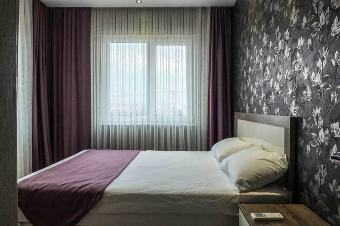 Imagen de la habitación del Udi Hotel. Foto 4