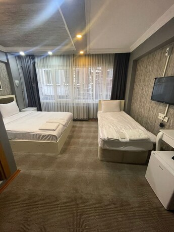 Imagen de la habitación del Ufuk Otel. Foto 19