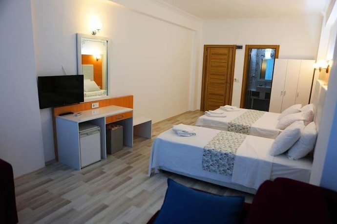 Imagen de la habitación del Ugur Hotel, Kas. Foto 17