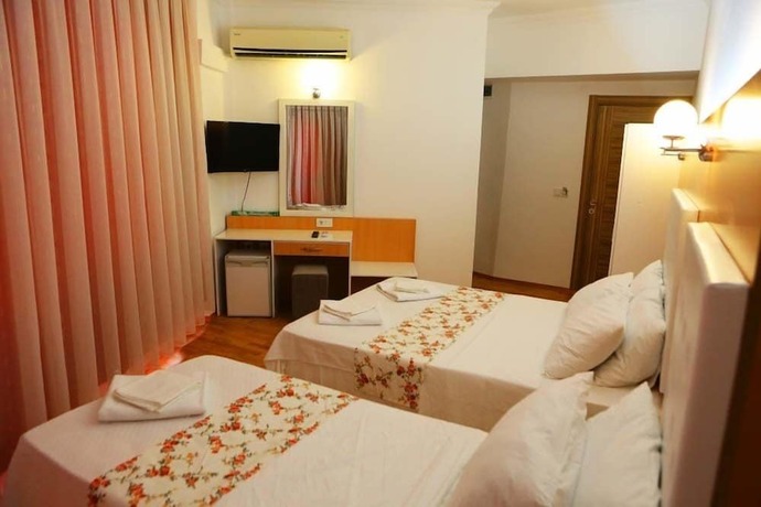 Imagen de la habitación del Ugur Hotel, Kas. Foto 19