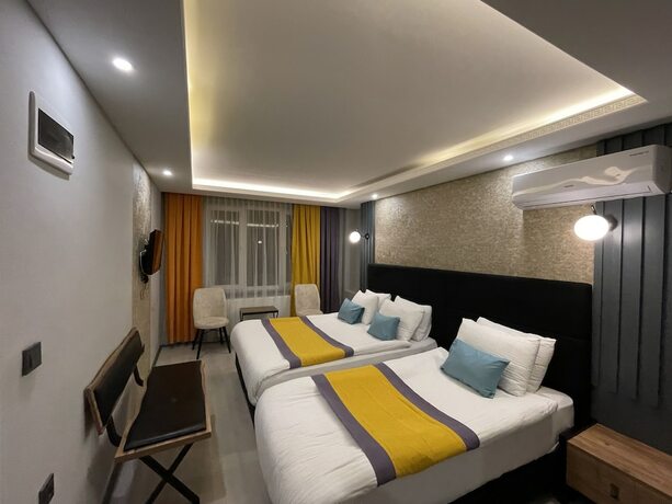 Imagen de la habitación del Ulu City Hotel. Foto 11
