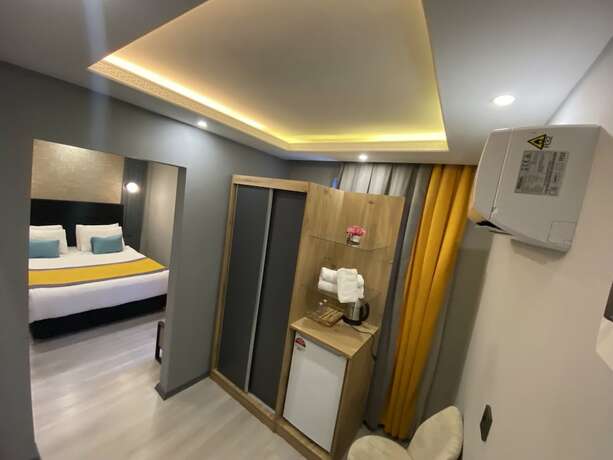Imagen de la habitación del Ulu City Hotel. Foto 12