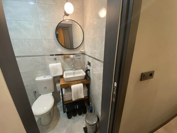 Imagen de la habitación del Ulu City Hotel. Foto 13