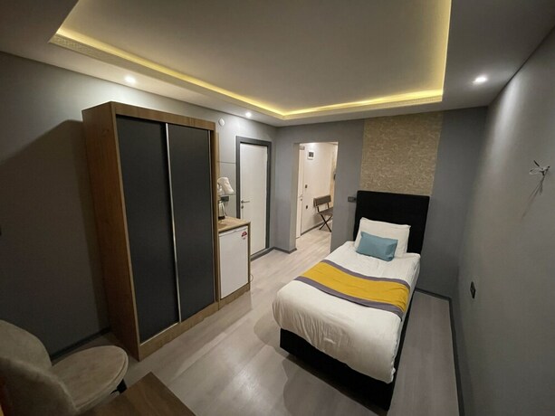Imagen de la habitación del Ulu City Hotel. Foto 16