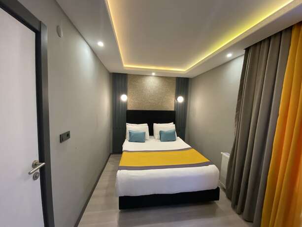Imagen de la habitación del Ulu City Hotel. Foto 17