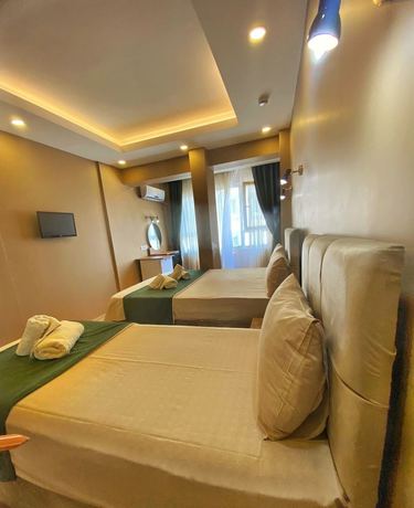 Imagen de la habitación del Ulubat Castle Hotel. Foto 9