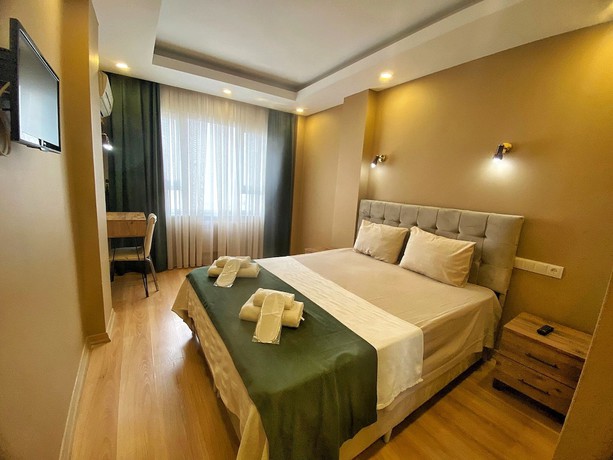 Imagen de la habitación del Ulubat Castle Hotel. Foto 13