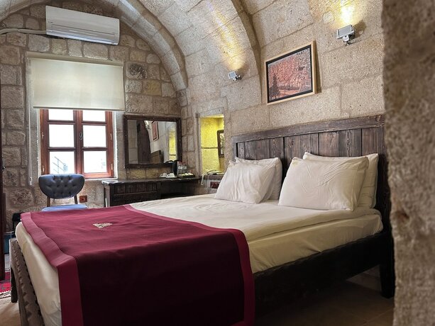 Imagen de la habitación del Under Cave Hotel. Foto 14