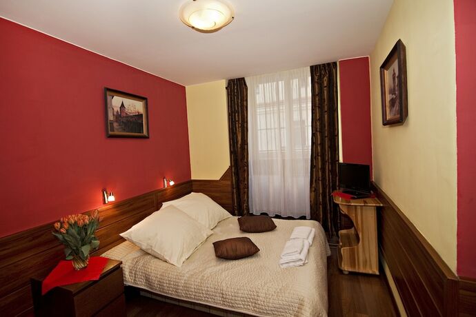 Imagen de la habitación del Unikat Guest Rooms. Foto 17