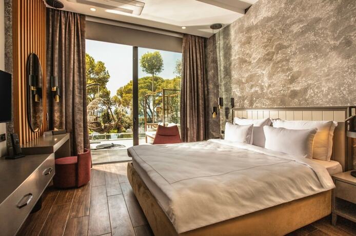 Imagen de la habitación del Unique Life Style Hotel. Foto 11