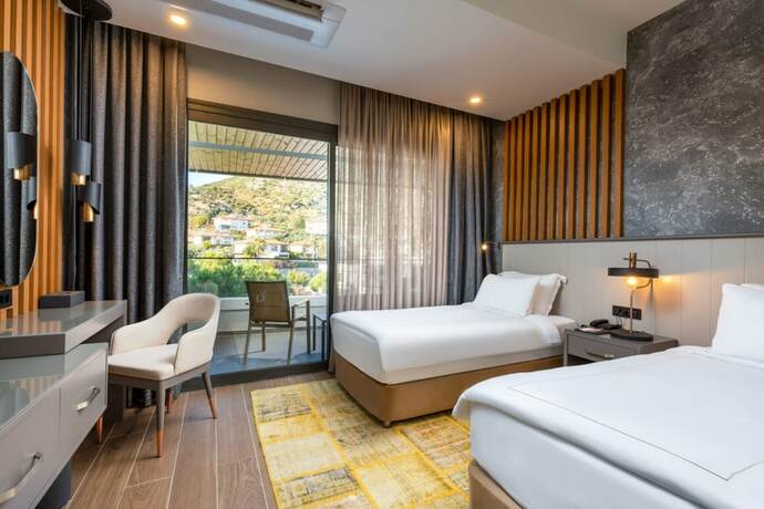 Imagen de la habitación del Unique Life Style Hotel. Foto 14