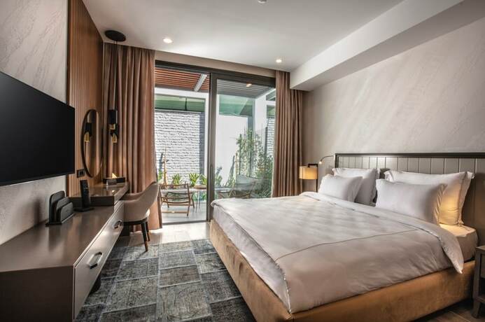 Imagen de la habitación del Unique Life Style Hotel. Foto 20