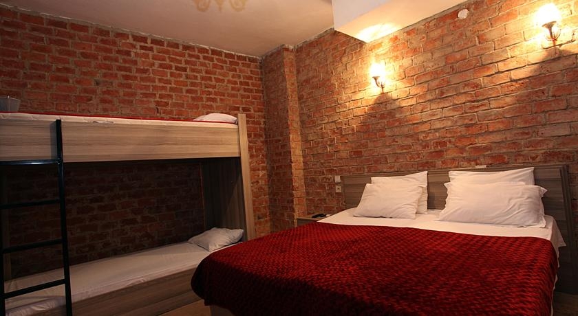 Imagen de la habitación del Unique Suite Hotel. Foto 6