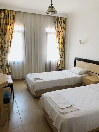Imagen de la habitación del Unlu Hotel, &Ouml;l&uuml;deniz. Foto 11