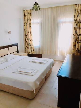 Imagen de la habitación del Unlu Hotel, &Ouml;l&uuml;deniz. Foto 14