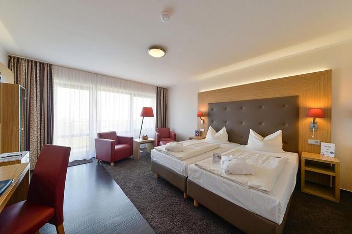 Imagen de la habitación del Upstalsboom Hotel Am Strand. Foto 11