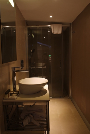 Imagen de la habitación del Upsuites Hotel. Foto 4