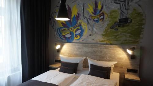 Imagen de la habitación del Urban Home Hotel. Foto 6