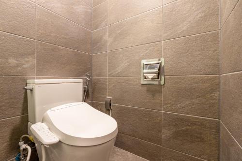 Imagen de la habitación del Urban Nest Hotel. Foto 16