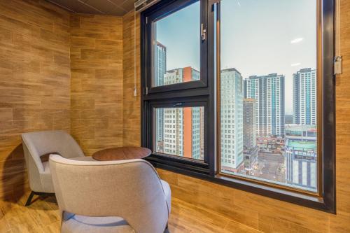 Imagen de la habitación del Urban Nest Hotel. Foto 17