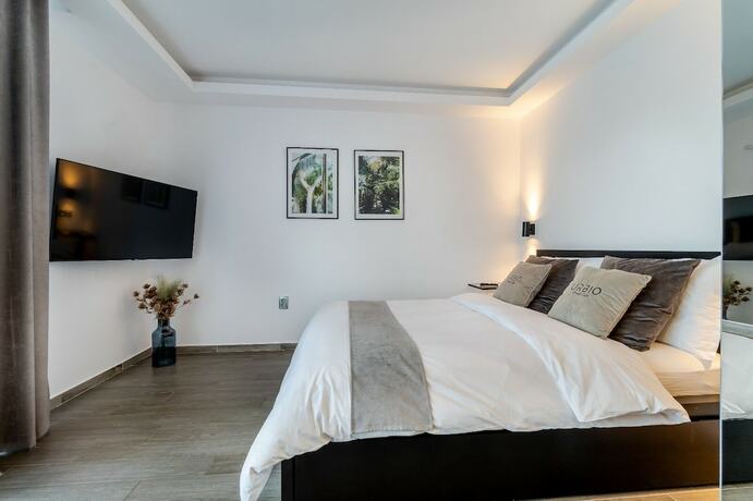 Imagen de la habitación del Urbio Private Suites. Foto 11