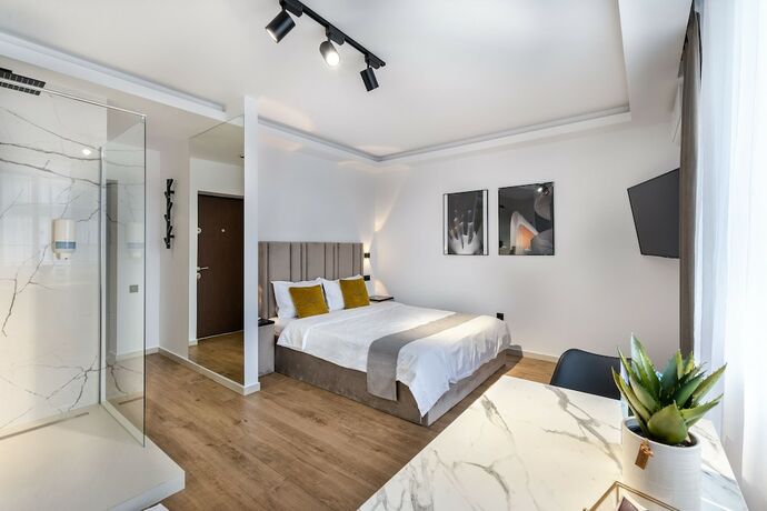 Imagen de la habitación del Urbio Private Suites. Foto 19