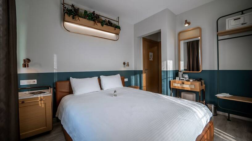 Imagen de la habitación del Urla 1867 Hotel. Foto 17