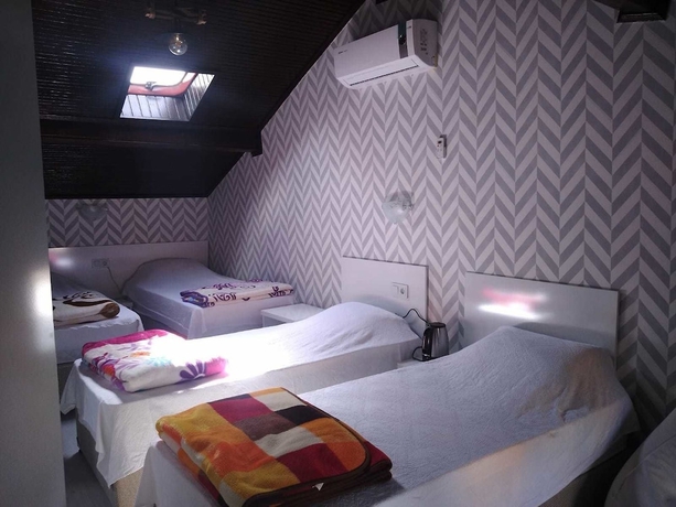 Imagen de la habitación del Urla Tarihi Han Otel. Foto 2