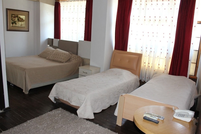Imagen de la habitación del Urla Tarihi Han Otel. Foto 3