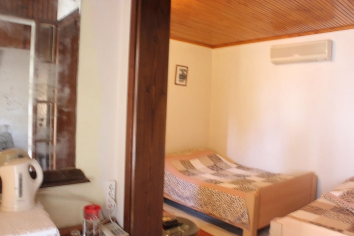 Imagen de la habitación del Urla Tarihi Han Otel. Foto 6