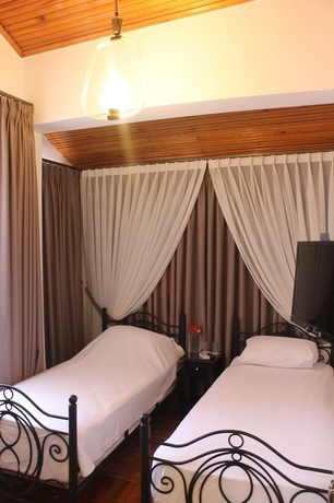 Imagen de la habitación del Urla Tarihi Han Otel. Foto 12