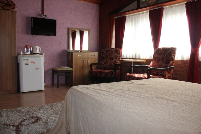 Imagen de la habitación del Urla Tarihi Han Otel. Foto 17