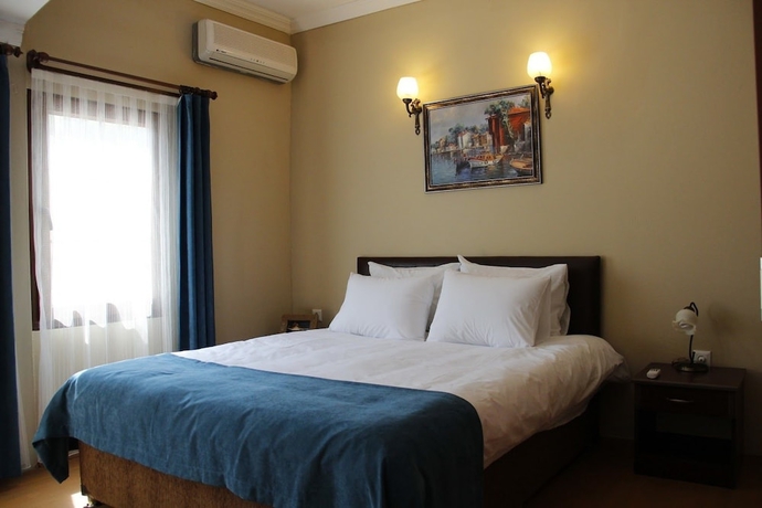 Imagen de la habitación del Utopia Lodge Hotel. Foto 13