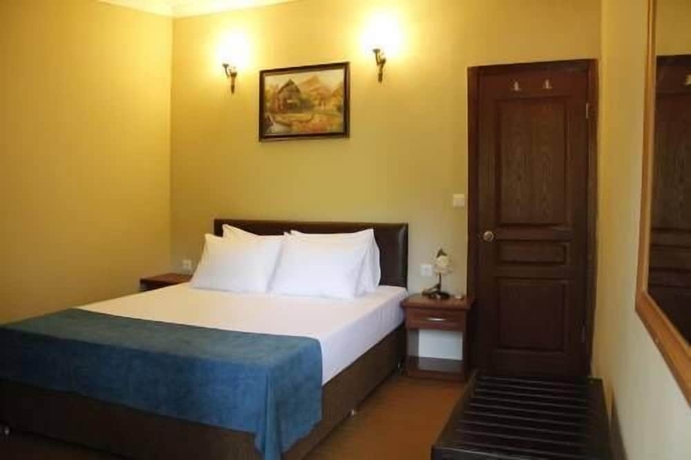 Imagen de la habitación del Utopia Lodge Hotel. Foto 14
